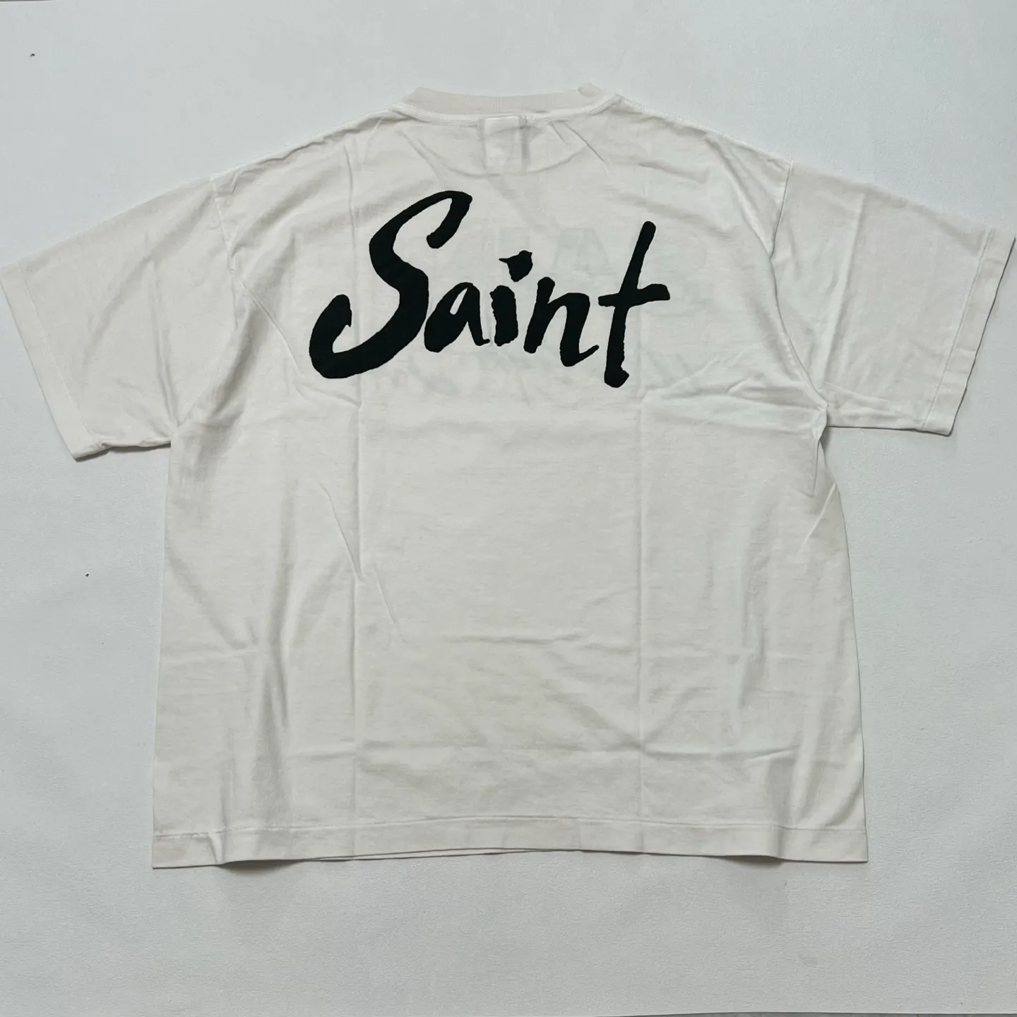 SAINT Mxxxxxx SS TEE/SUPER DIRTY/WHT oil painting SAINT SUPER DIRTY slogan TEE off-white S-XL Made of original OE yarn tube weaving without side seams to distinguish the split fabrics original consistent VINTAGE label/little angel anti-counterfeiting label top printing technology highly restored original details
